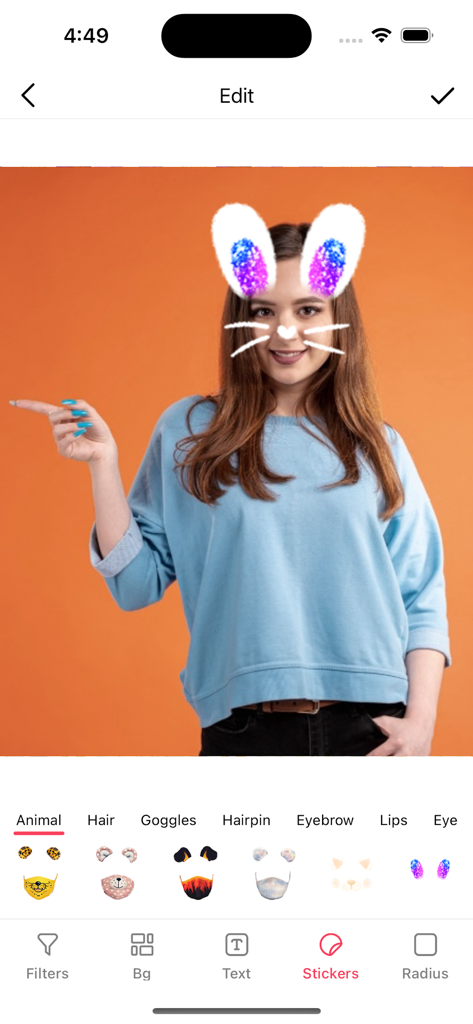 Beauty Camera- AI Photo Editor - A photo of a woman being edited with AR bunny ears and whiskers stickers in the Beauty Camera app interface