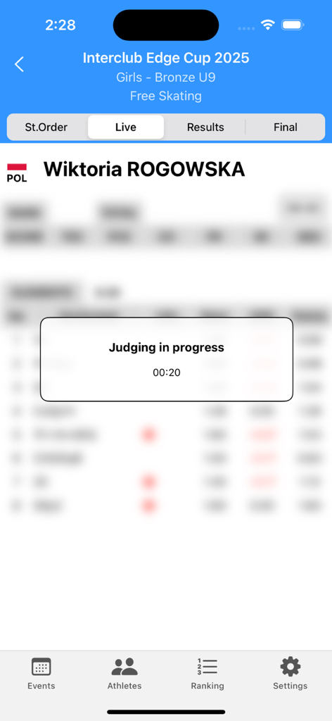 A interface do Skating App exibindo o status de julgamento ao vivo durante um evento de patinação artística
