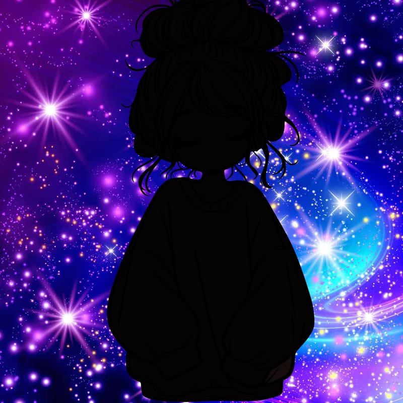 girl with baggy sweatshirt and messy bun