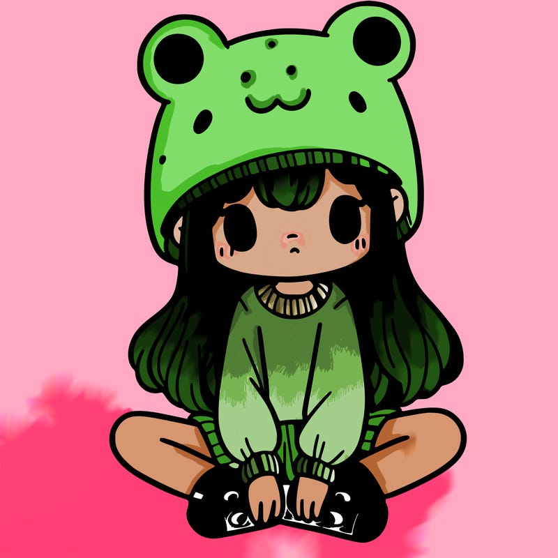 a girl wearing a frog hat and some frog socks