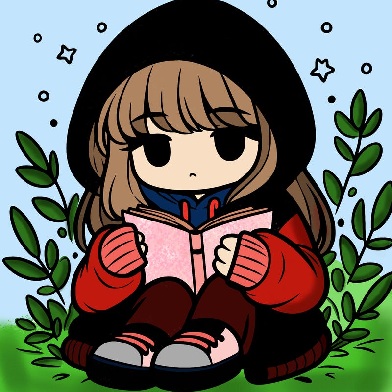 girl in oversized hoodie reading a book
