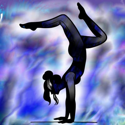 a woman doing a handstand