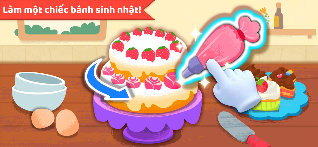 Decorating a two tier strawberry birthday cake with pink frosting in a kids game