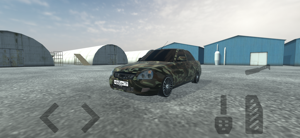 A camouflaged car in an open industrial area from the Simulator Real Oper Car game.