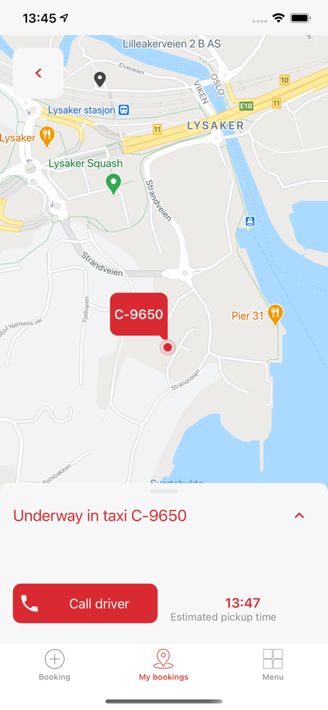 07000 Taxi - Interfaccia dell'app 07000 Taxi che mostra una mappa live con il tracciamento del taxi C-9650 con un pulsante per chiamare l'autista e l'orario stimato di arrivo.