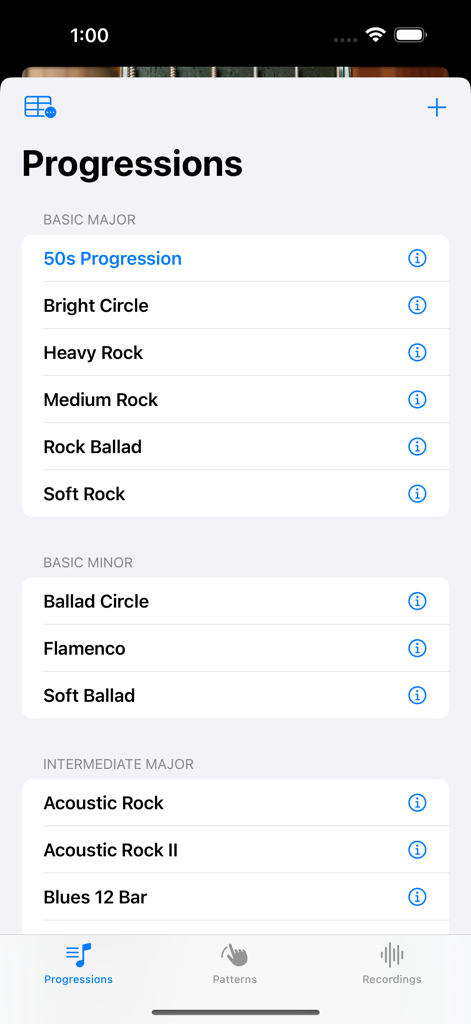 Guitar Elite-Chord Play Center - La interfaz de la aplicación Guitar Elite muestra una lista de progresiones de acordes categorizadas por estilo y dificultad, incluyendo rock y flamenco.