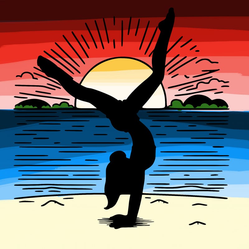 girl doing handstand infront of a sunset