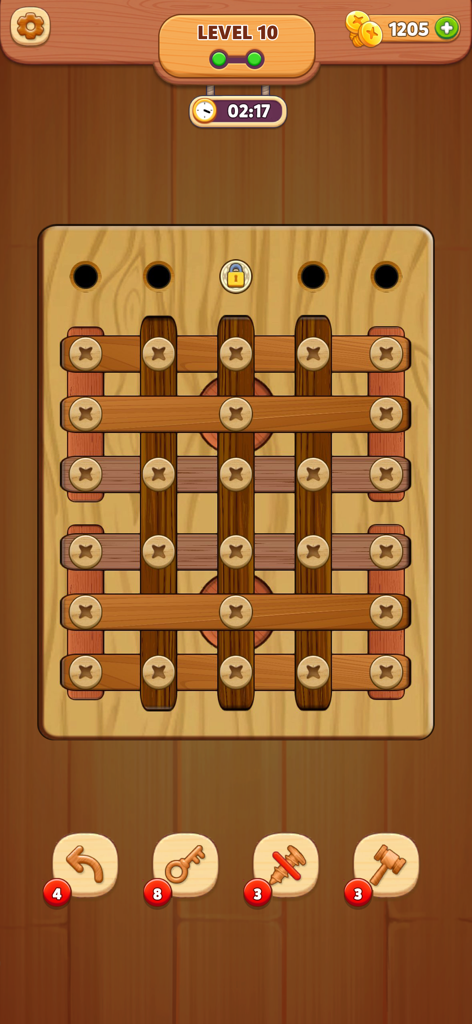 Niveau 10 du jeu Woodout montrant un plateau de puzzle en bois avec des écrous et des boulons