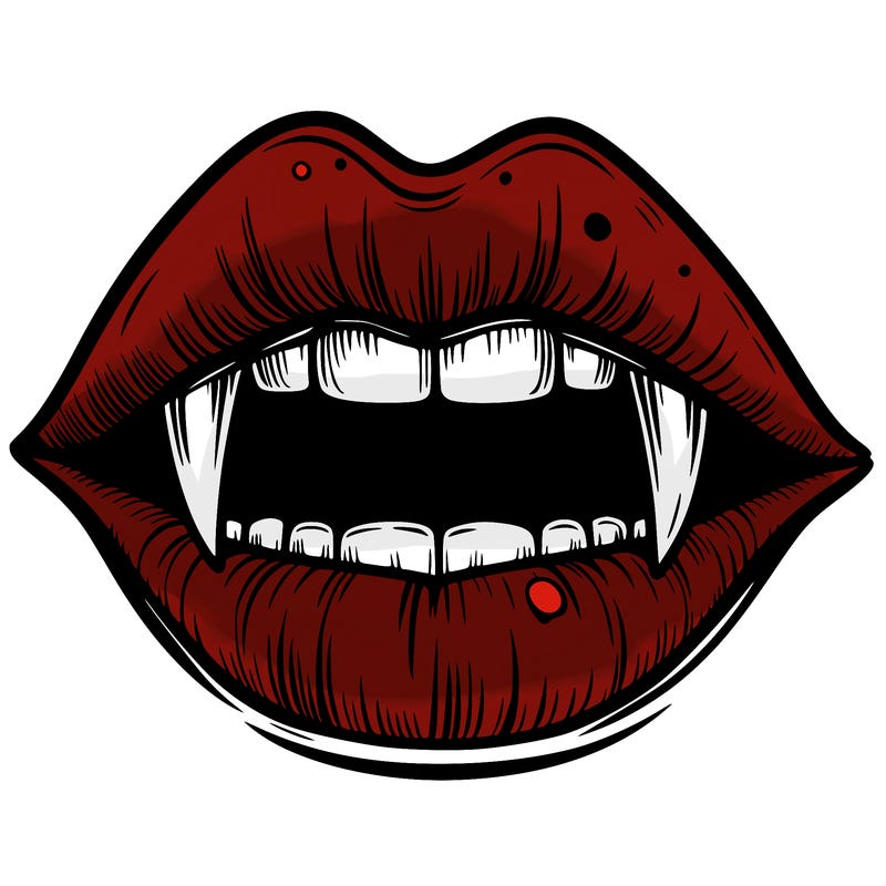 lips with vampire teeth