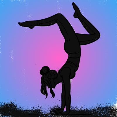 a woman doing a handstand