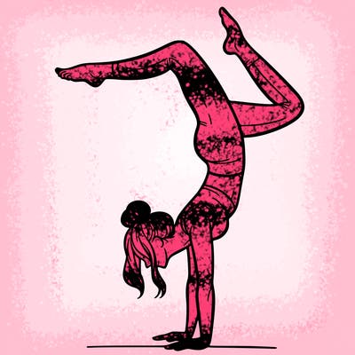 a woman doing a handstand