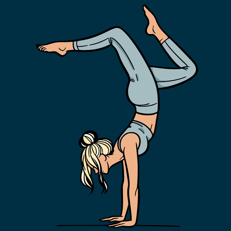 a woman doing a handstand