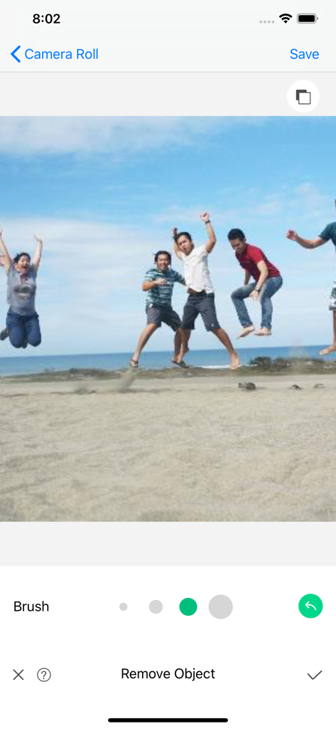 Object Removal Pro - Eraser Me - Interfaz de aplicación móvil que muestra una foto de playa siendo editada con una herramienta de pincel para eliminar personas no deseadas