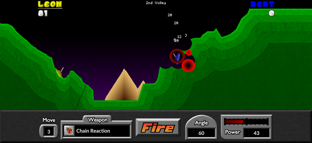 A 1v1 artillery battle in Pocket Tanks showing two tanks on green hills with projectile trajectories and game controls