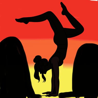 a woman doing a handstand