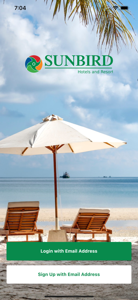 Sunbird Hotels & Resorts - Pantalla de inicio de sesión de la aplicación Sunbird Hotels and Resorts con fondo de resort de playa tropical