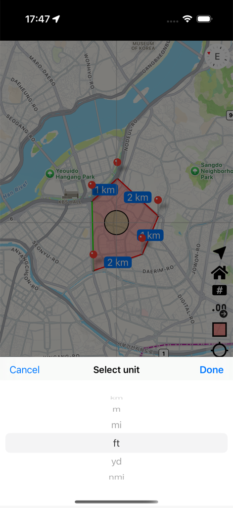 Interface of the Area and Distance app showing a measured map area and a unit selection menu at the bottom
