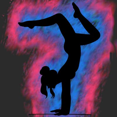 a woman doing a handstand