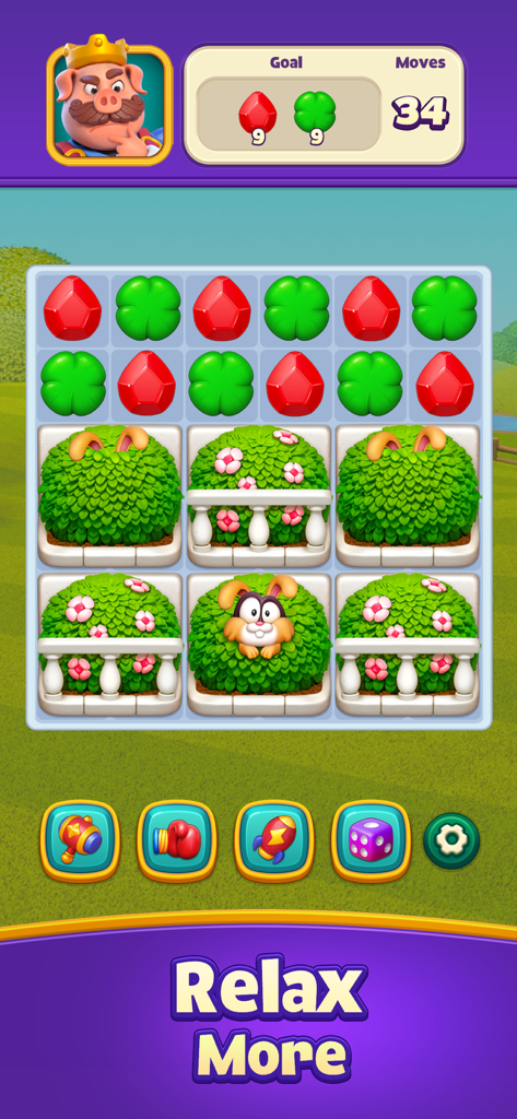 Gameplay screen of Piggy Kingdom showing a match 3 puzzle board with gems and boosters.