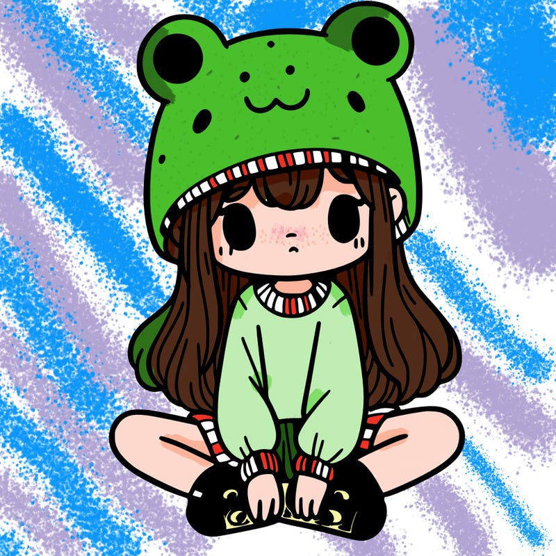 a girl wearing a frog hat and some frog socks