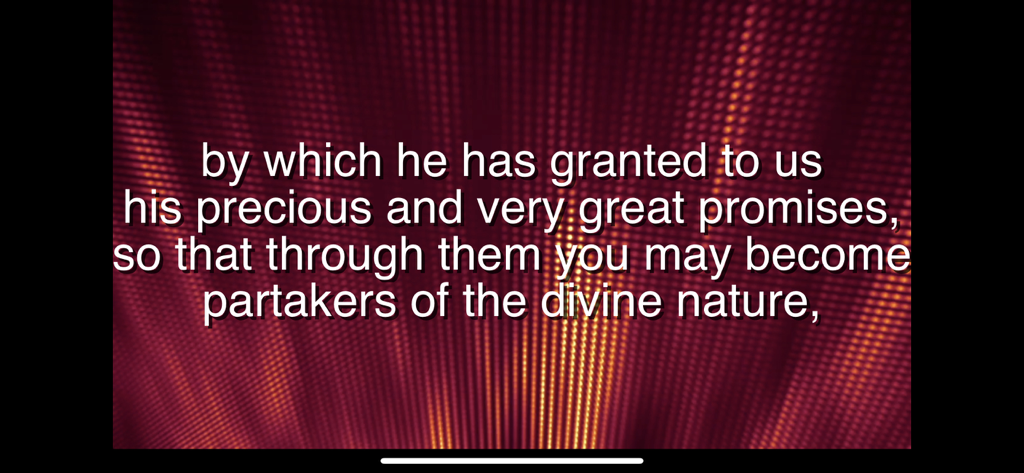 WorshipStorm Projector - Scripture text slide on a red and orange textured background in the WorshipStorm Projector app