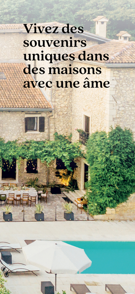 A rustic stone vacation villa with a swimming pool and outdoor dining area