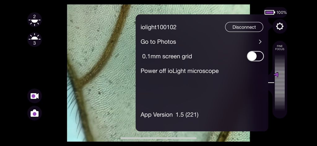 Settings menu overlay on the ioLight Microscope app displaying capture and focus controls over a microscopic image.