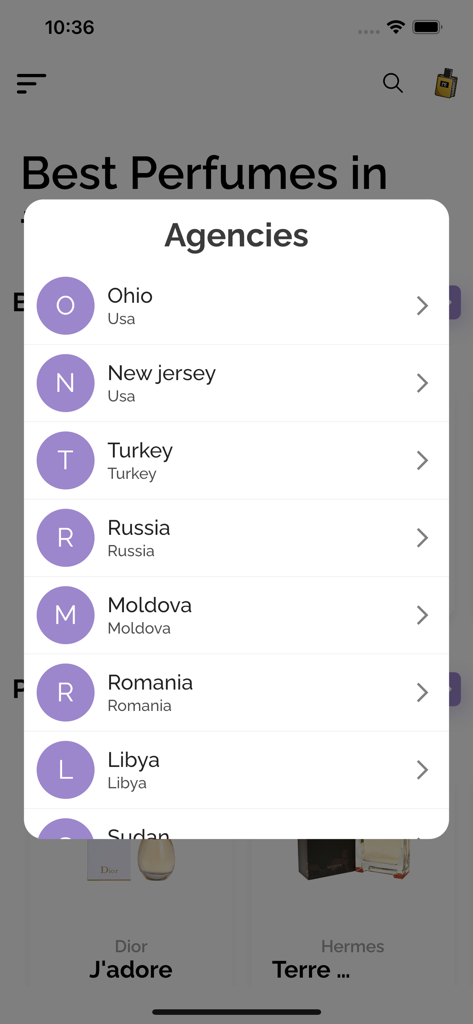 Ein Pop-up-Menü mit dem Titel Agenturen in der Perfumes Book App zeigt eine Liste von Standorten, darunter Ohio, New Jersey, Türkei und Russland.