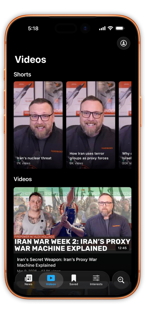 Sandboxx News - A mobile interface of the Sandboxx News app showing military video briefings and defense analysis shorts.