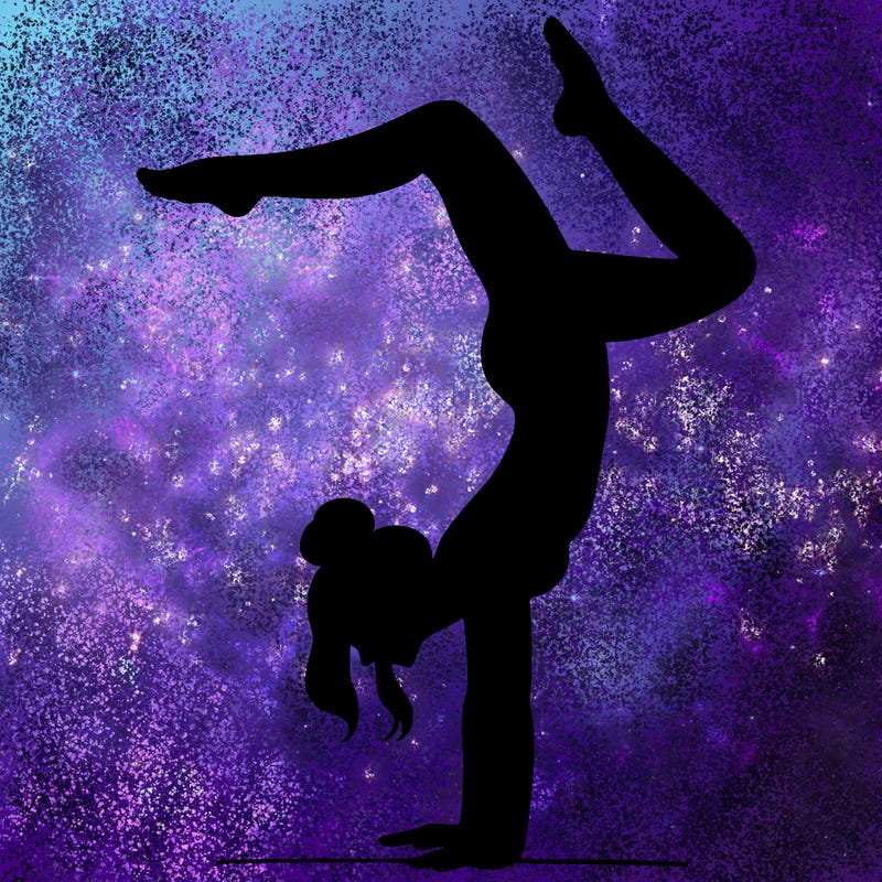 a woman doing a handstand