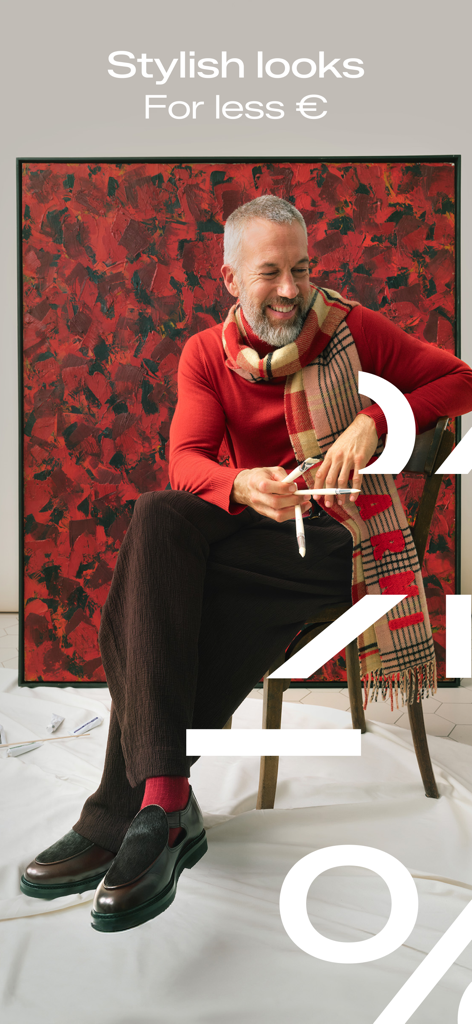 Lounge by Zalando | Outlet - A man in a red sweater and scarf showcasing stylish premium looks for less