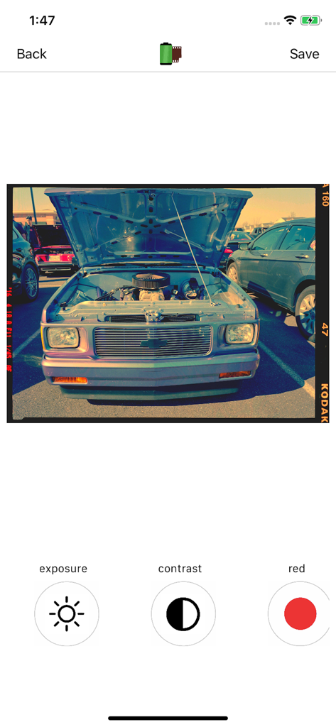 Film scanner Pro - A user interface of the Film scanner Pro app showing exposure and contrast editing tools for a scanned photo of a vintage truck