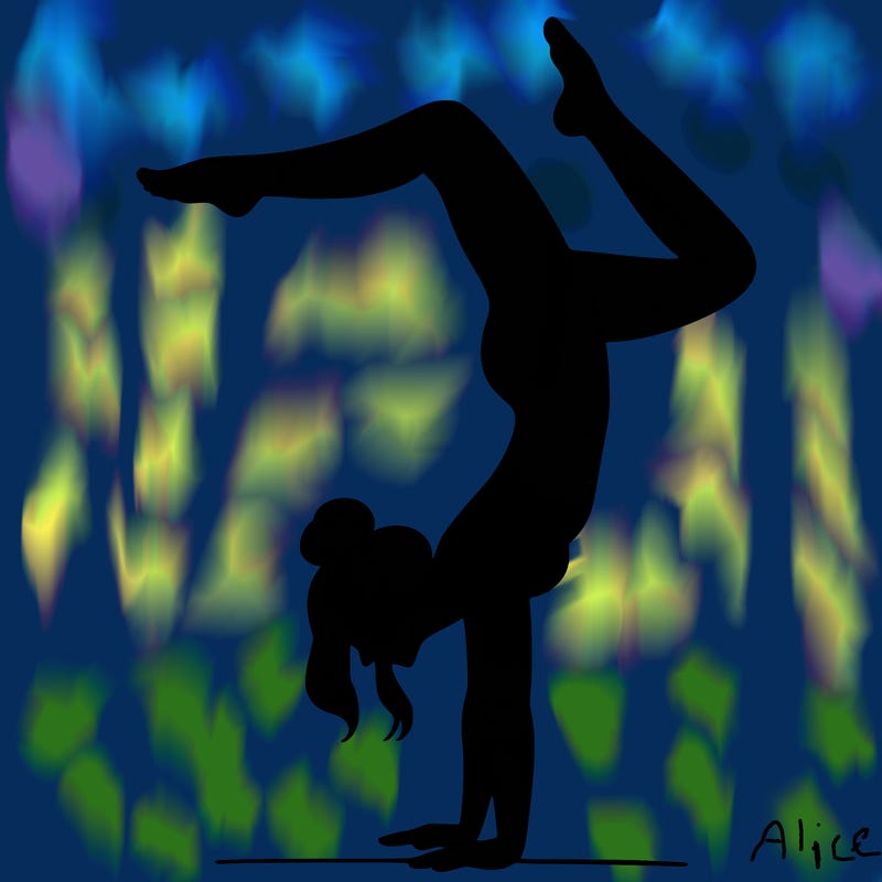 a woman doing a handstand