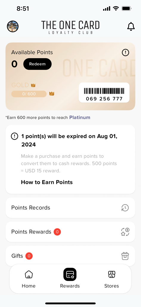 Tela inicial do aplicativo The One Card Loyalty Club exibindo código de barras do membro e pontos de recompensa