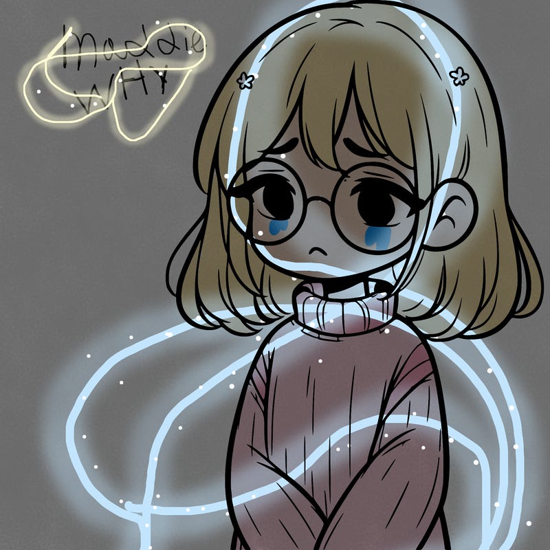 sad girl with glasses in a sweater