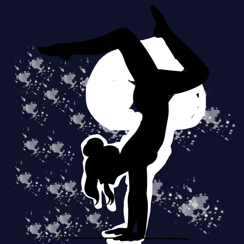 a woman doing a handstand