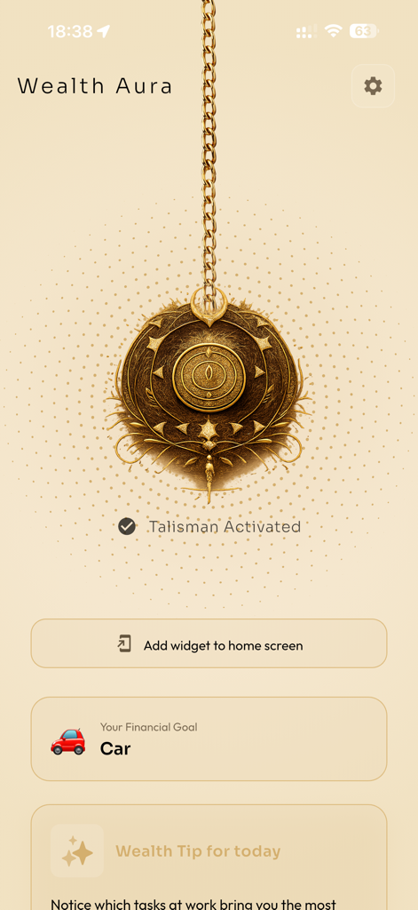 Wealth Aura - Interfaz de la aplicación móvil Wealth Aura que muestra un talismán de manifestación dorado y una meta financiera.