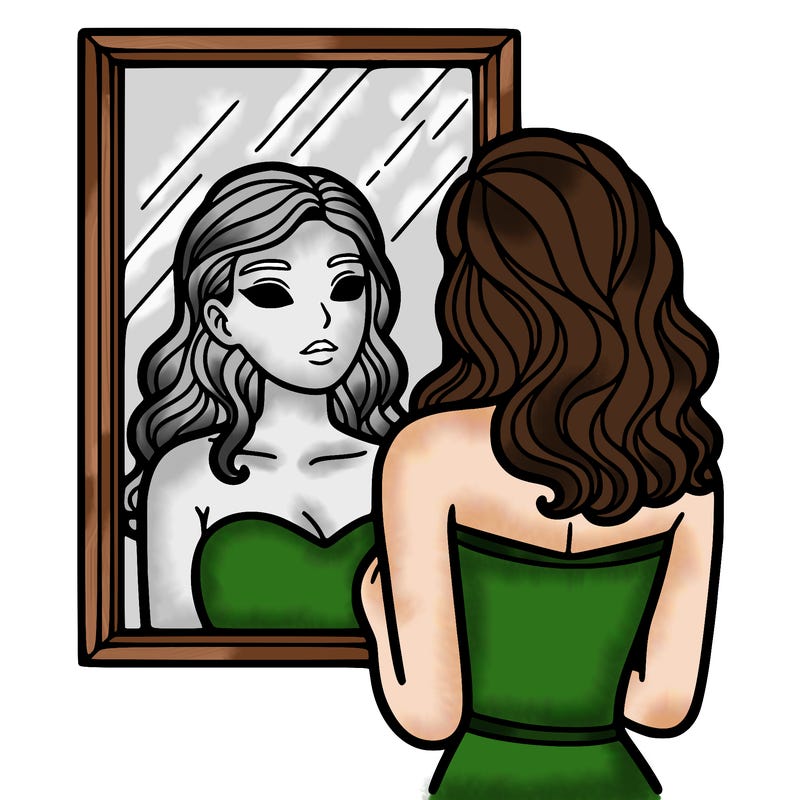 a woman looking at herself in the mirror.