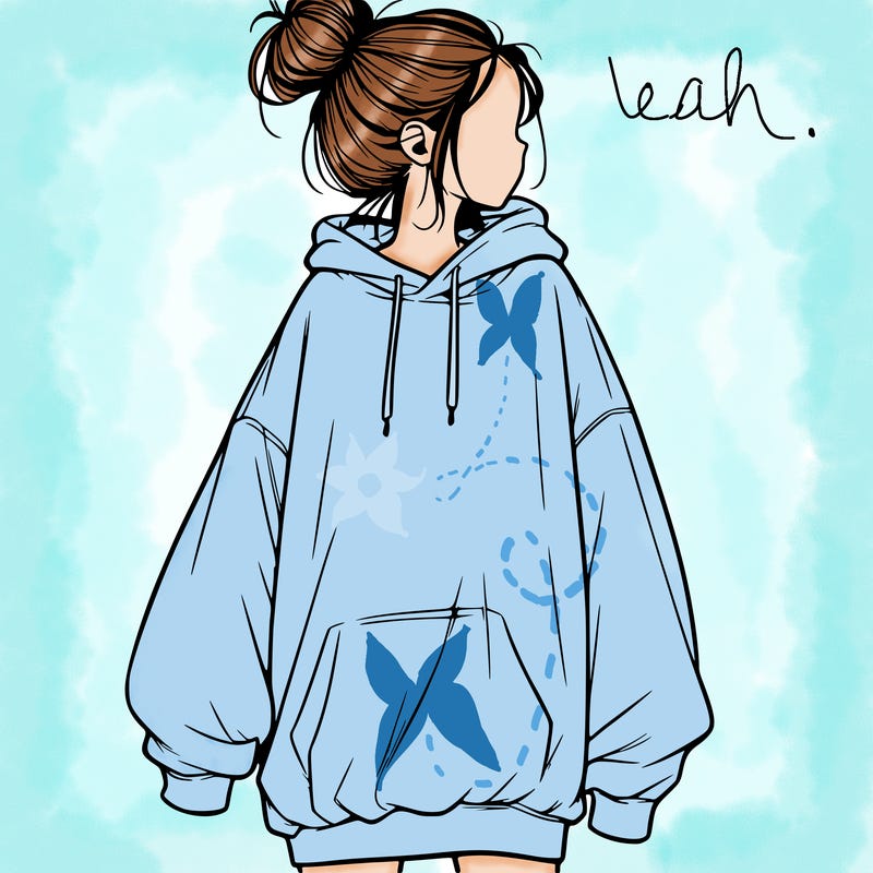 realistic girl with a oversized sweatshirt on and a bun