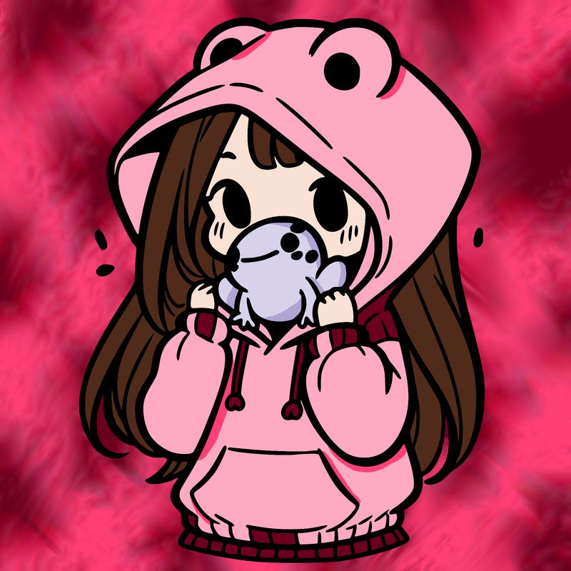 a girl holding a froggy hoodie