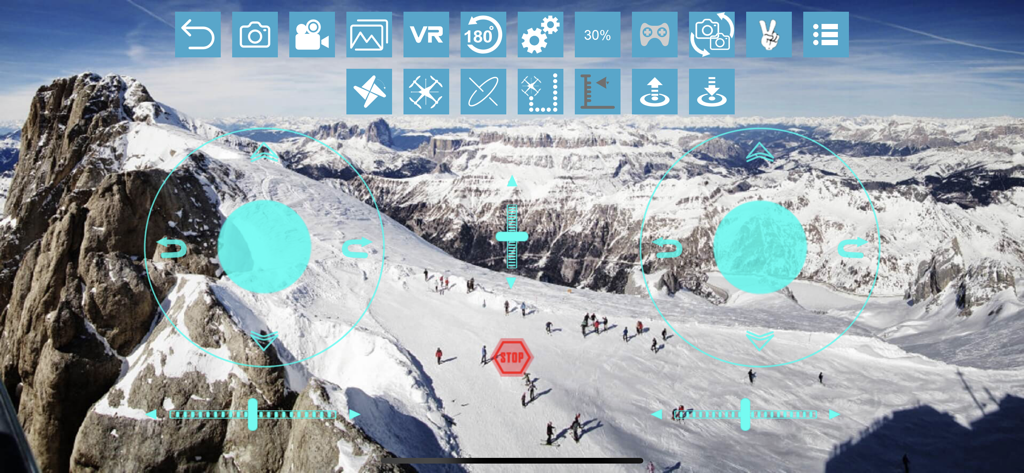RCFPVPro - RCFPVPro app mobile interface with virtual drone joysticks and aerial FPV view of snowy mountains