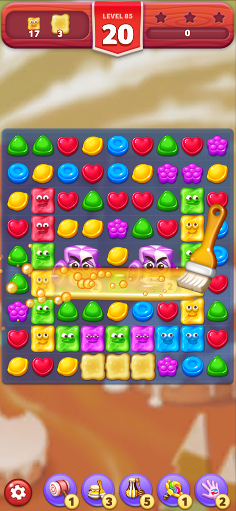 Lollipop2 & Marshmallow Match3 - Gameplay of Lollipop 2 and Marshmallow Match 3 showing a paintbrush booster being used on a row of colorful candies at level 85.