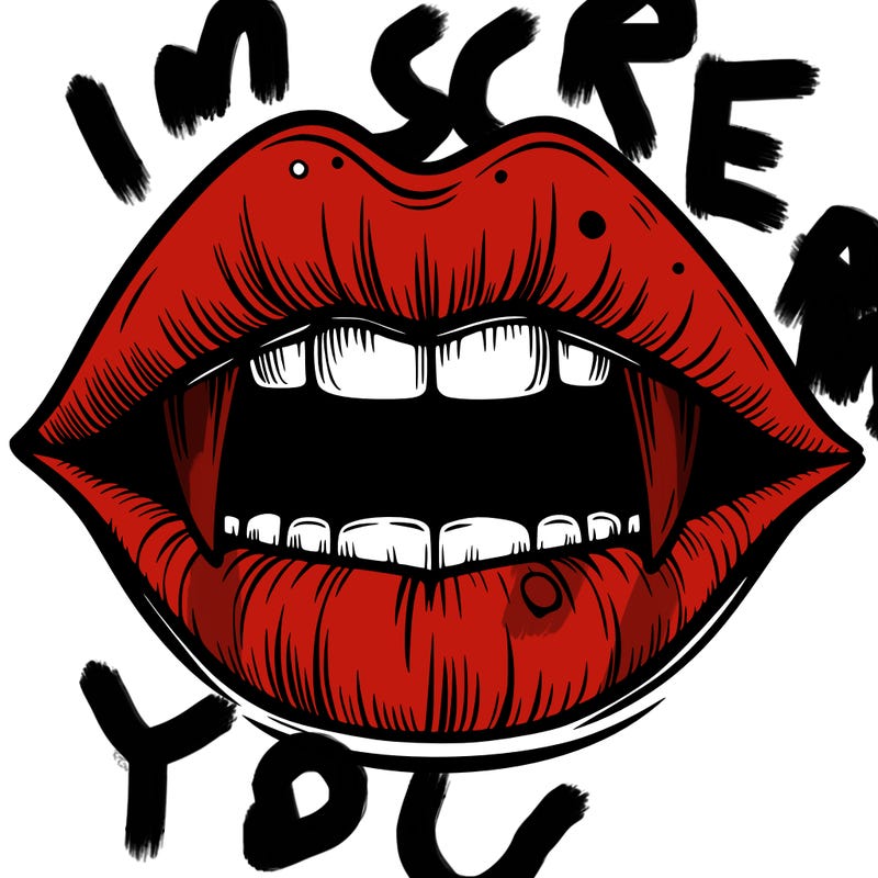 lips with vampire teeth