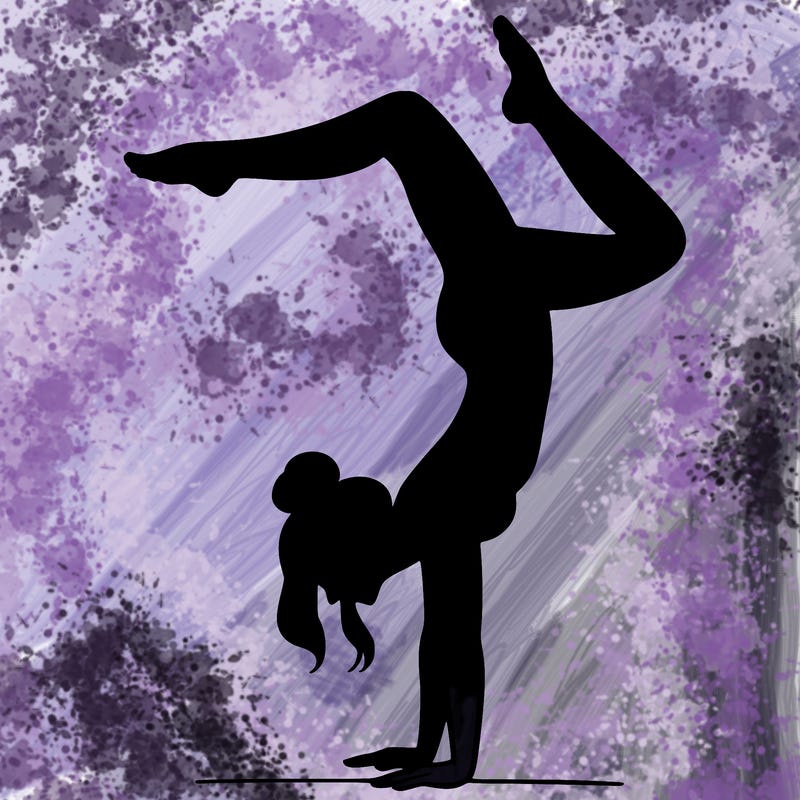 a woman doing a handstand