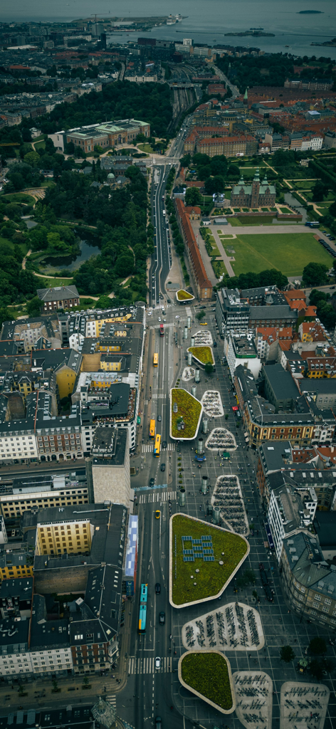 High angle aerial view of a European city landscape showing streets and buildings from above