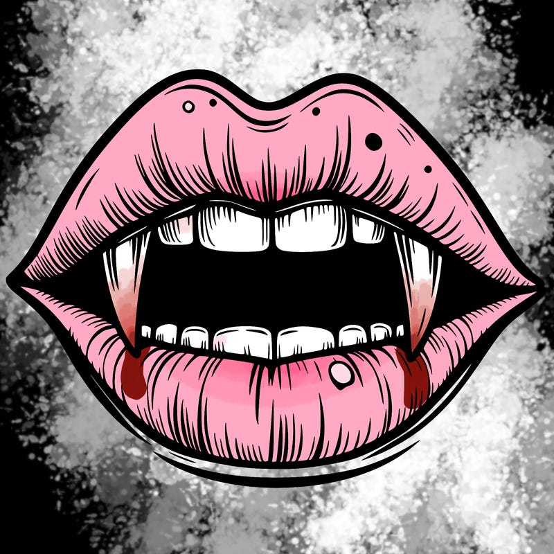 lips with vampire teeth