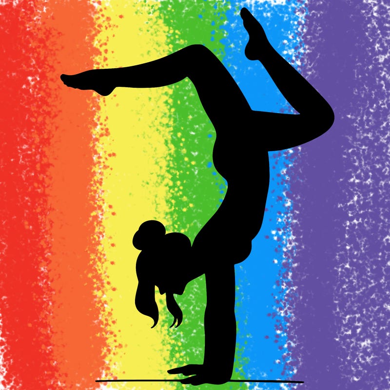 a woman doing a handstand