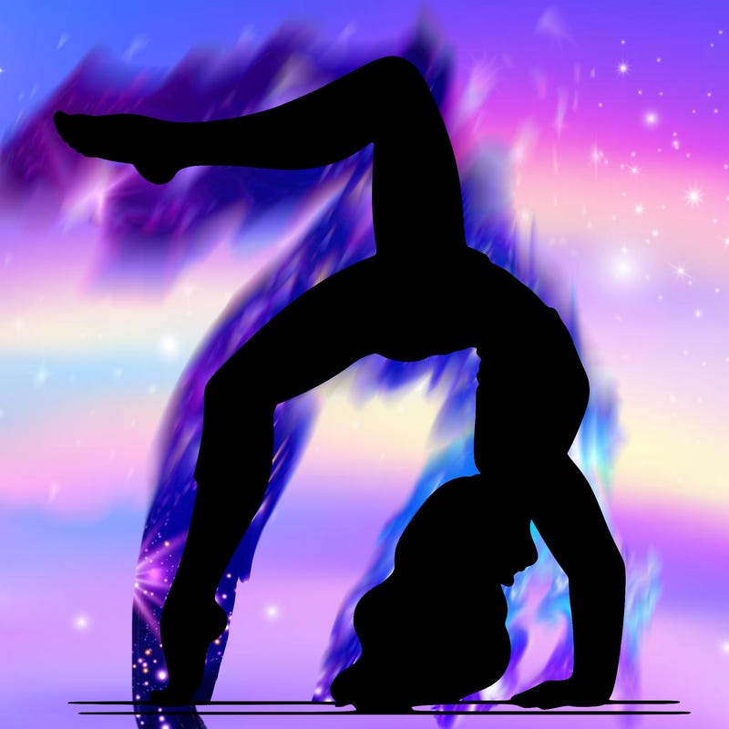 a woman doing a h andstand