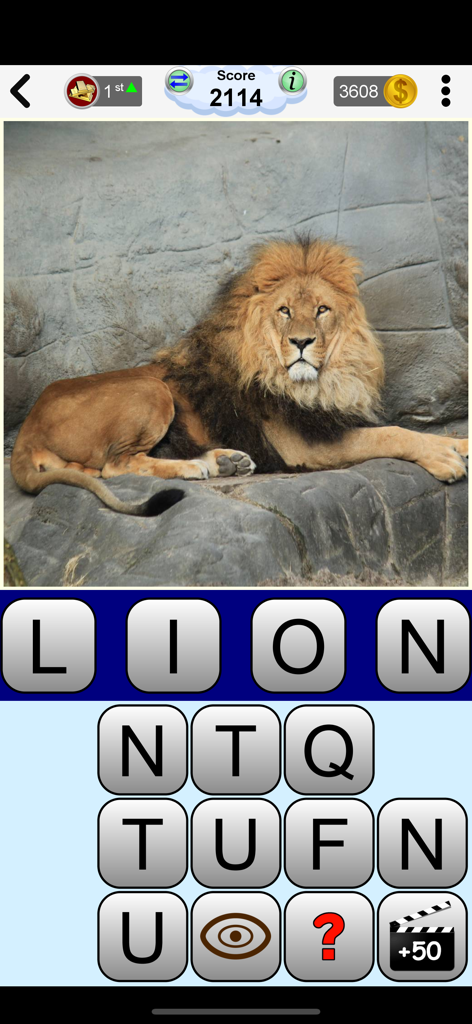 Arrow Crossword & Other Games - A picture quiz game screen featuring a lion and the word lion spelled out