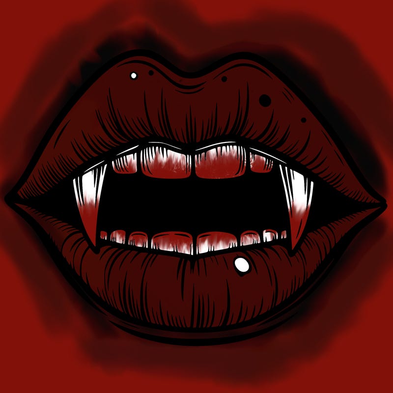 lips with vampire teeth